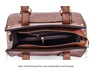 Detailed view of spacious internal compartments with zipper pocket in brown leather tote