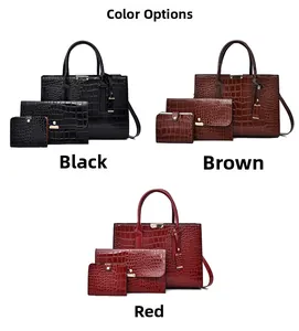 Vue détaillée de l'ensemble de sacs à motif crocodile en noir, marron et rouge