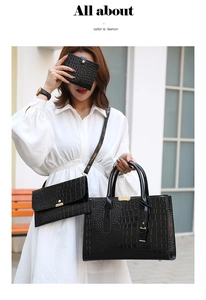 Détail de l'ensemble sac à main noir à motif crocodile, bandoulière et portefeuille