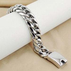 Mens thick polished stainless steel Cuban link bracelet with heavy double weave texture