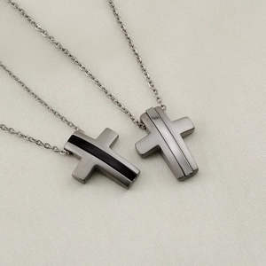 Minimalist vintage cross pendant necklace in black and silver brushed metal style