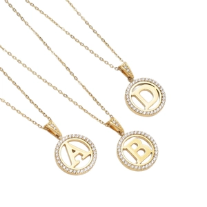 Gold plated stainless steel necklace with circular letter pendant and zircon stones