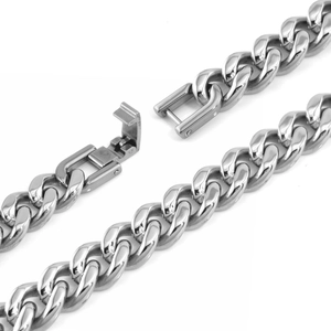 Macro detail of the polished stainless steel Cuban link bracelet and secure folding clasp