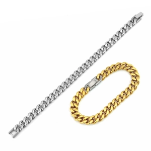 Detailed view of silver and gold stainless steel Cuban link bracelets with fold-over clasps