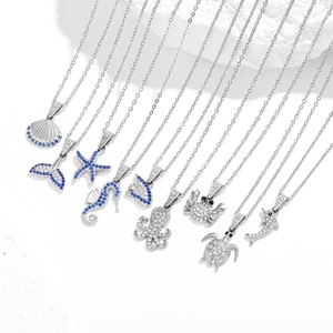 Detailed collection of stainless steel ocean themed necklaces with zircon starfish and shell