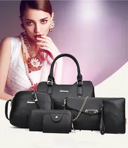 Detailed set of 6 black lychee leather handbags featuring gold metal hardware and logo