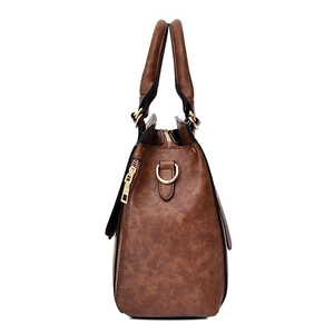 Minimalist brown retro PU leather tote bag with gold D-ring and decorative side zippers