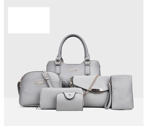 Detail of 6-piece grey lychee pattern faux leather handbag set with gold hardware