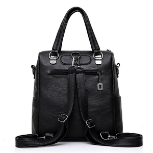 Black pebbled leather backpack for women with dual top handles and silver zippers