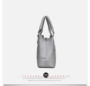 Side view of the medium gray tote bag with lychee texture and three-layer structure