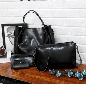 Conjunto de tres piezas con bolso tote grande de cuero negro, bolso de hombro y cartera larga