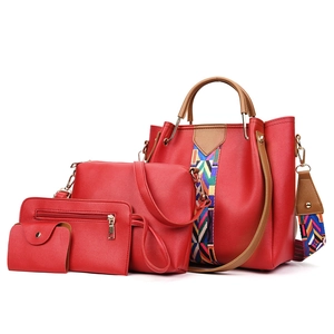 Rode 4-delige modieuze handtassenset inclusief tote en clutch met schouderband