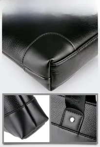 Close-up of black lychee grain leather briefcase with reinforced stitching and strap details