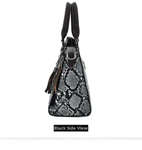 Detail view of stylish snake pattern handbag with metal zipper and leather tassel charms