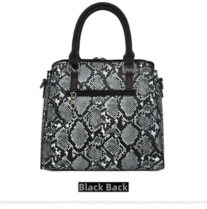 Rear view of crocodile pattern handbag showing zip pocket and stitching details