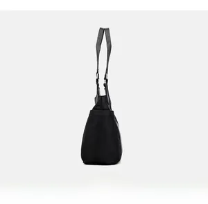 Side view of black oxford fabric tote bag with spacious capacity and long handles