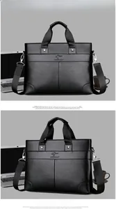 Close-up of black pebble leather briefcase with kangaroo logo and detachable strap