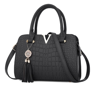 Classic black crocodile pattern handbag with gold V logo and tassel for women