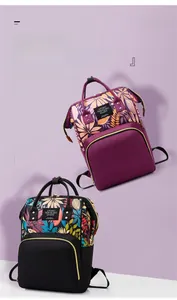Close-up of floral print mummy backpacks with multi-compartment storage in purple and black