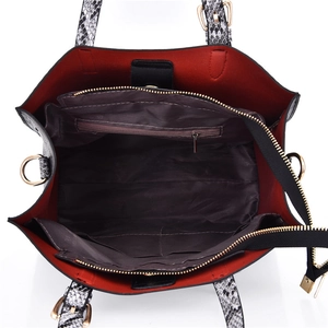 Python embossed tote bag with spacious red interior lining and secure gold zipper