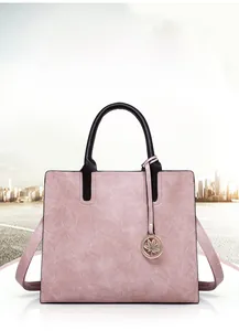 Pink faux leather tote bag with lychee texture and golden maple leaf pendant detail