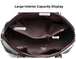 Detail view of large capacity interior with crocodile pattern and organized compartments