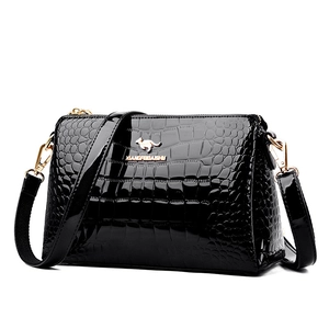 Elegant black patent leather shoulder bag with crocodile texture and gold hardware
