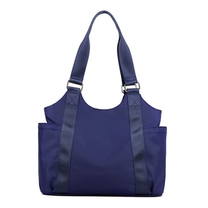 Minimalist navy blue oxford tote bag with dual shoulder straps and side pockets