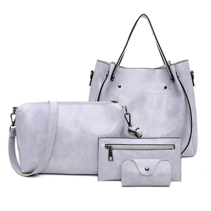 Conjunto de 4 bolsos de color lila claro con bolso tote, bandolera, cartera y monedero
