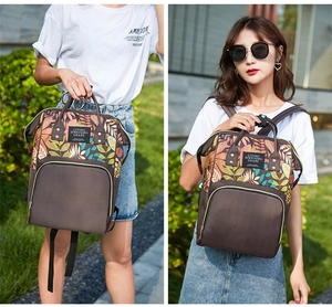 Detail of multi-functional mom backpack with autumn leaf prints and nylon fabric