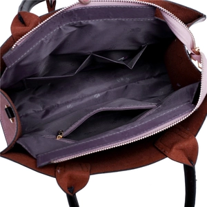 Interior view of three-piece tote bag showing spacious compartments and zipper pocket