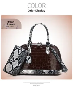 Brown crocodile embossed handbag set with snake pattern handles and matching wallet