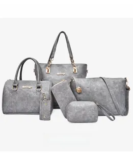 Detailed view of 6-piece grey leather tote bag set including wallets and shoulder bags