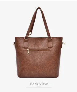 Back view of brown faux leather tote bag showing a horizontal zipper pocket and gold hardware