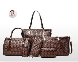 Detail of a brown six-piece handbag set featuring glossy patent faux leather and diamond quilt