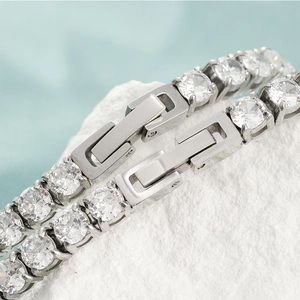 Elegant stainless steel tennis bracelet with sparkling cubic zirconia on a stone base