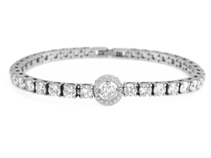 Detailed macro view of silver tennis chain bracelet with round-cut sparkling crystals