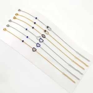 Set de 6 pulseras de acero de titanio con diseño de hoja y ojo turco en oro y plata