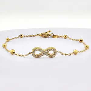Golden titanium steel infinity bracelet with crystals on a fine link chain