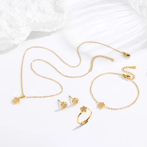 Set gioielli lusso in acciaio dorato con collana e orecchini a fiore con zirconi