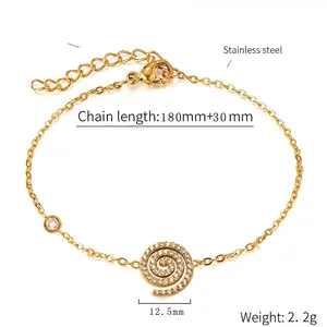 Detail of 18K gold plated stainless steel bracelet with sparkling heart charm and clasp