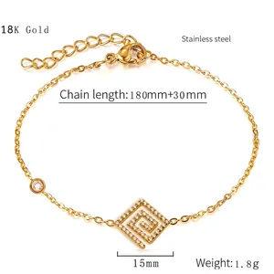 Detail of 18K gold stainless steel heart bracelet with paved zircon and lobster clasp