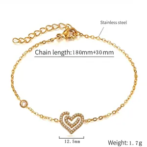 Detailed macro view of 18K gold plated stainless steel heart bracelet with sparkling zircon