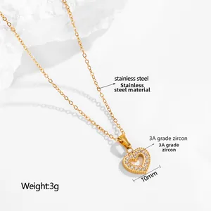 Macro detail of 10mm gold heart pendant with 3A grade zircon inlays on stainless steel chain