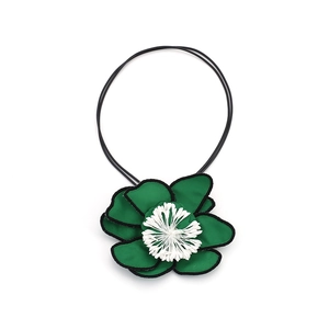Minimalist handmade dark green fabric flower necklace with elegant black rope and white pistil