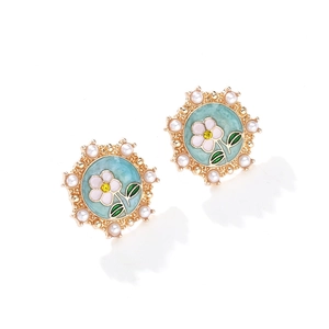 Elegant gold flower stud earrings with blue enamel, pearls and crystals in a pair