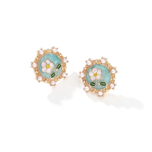 Pastel floral enamel earrings with white pearls and gold accents on white background