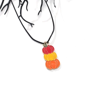 Retro gradient pumpkin stack necklace with colorful pendants on a black string for Halloween