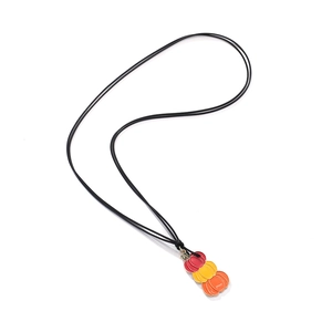 Retro gradient pumpkin pendant necklace with three stacked layers on a black wax cord