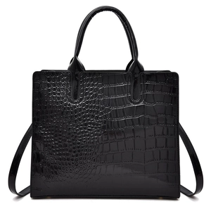 Classic black crocodile pattern tote bag with polished finish and versatile shoulder straps